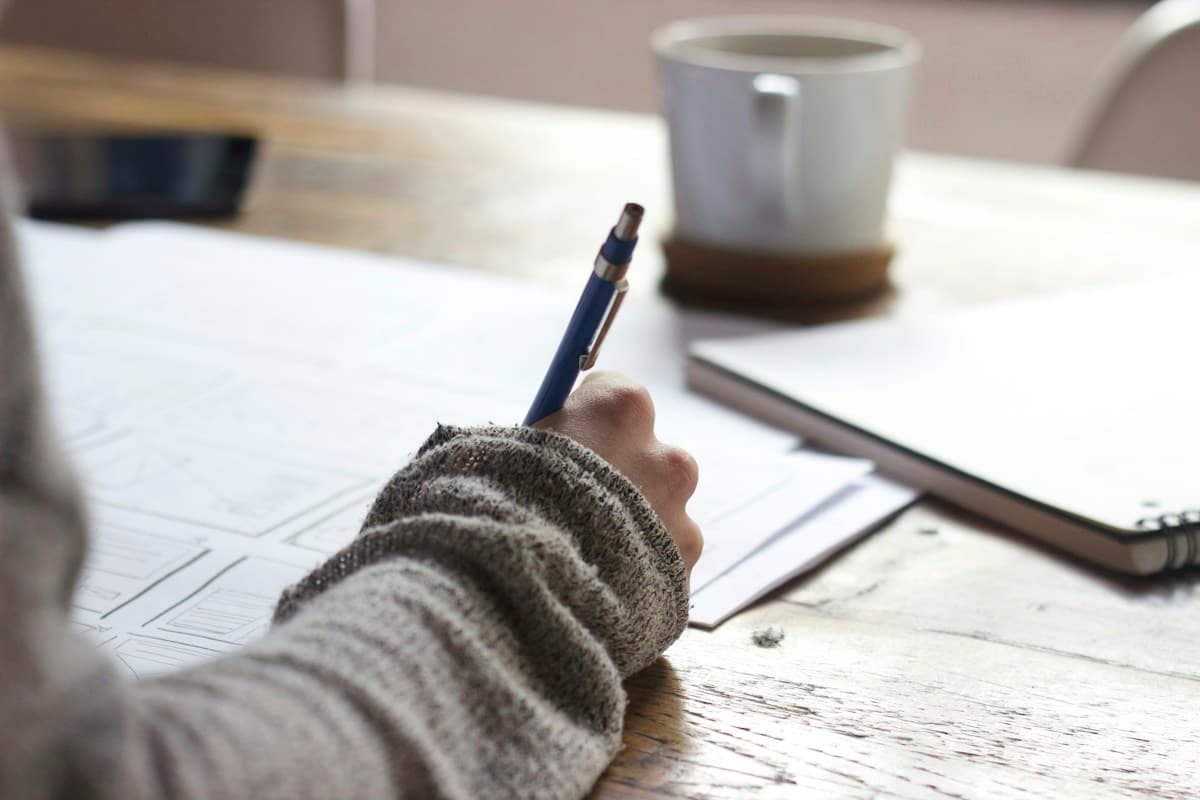 Online course learning workspace with a laptop